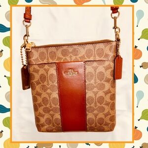 Coach Kitt Messenger
Crossbody In Tan and Rust